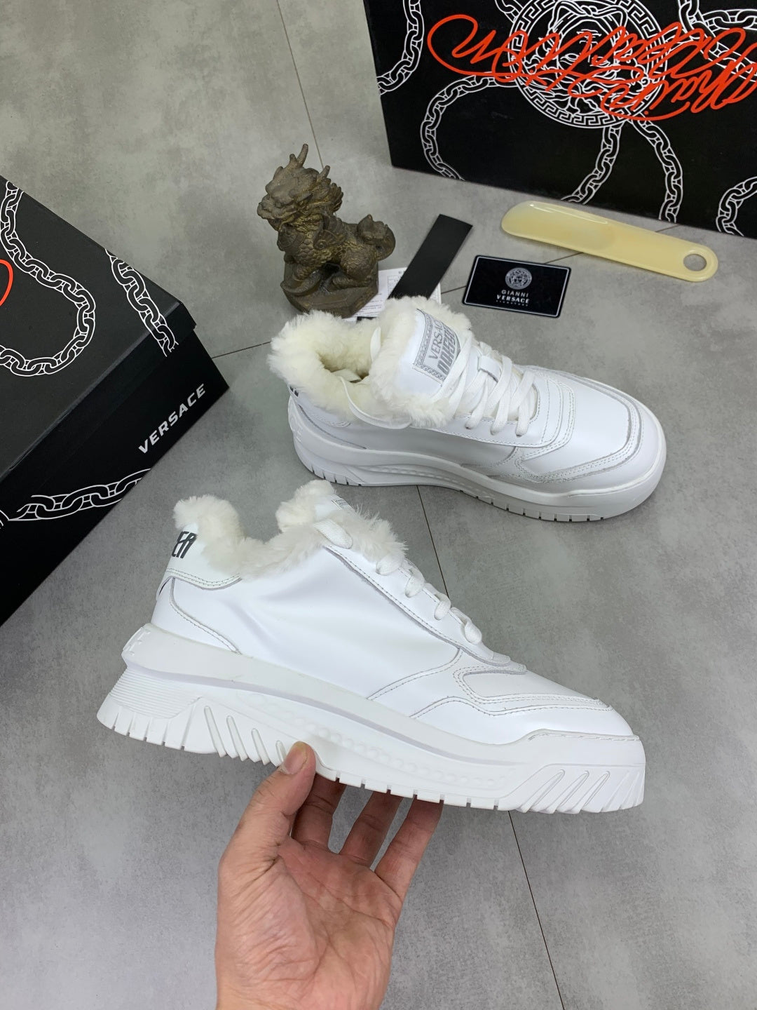 Versace white leather sneakers with fuzzy cuffs and chunky sole