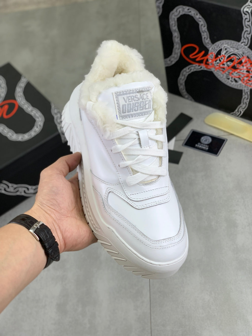 Versace white leather sneaker with fuzzy collar and lace-up front