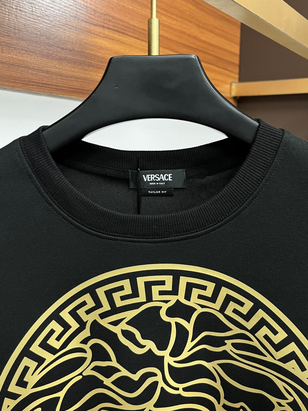 Versace crewneck sweatshirt neckline in black with gold Medusa logo print