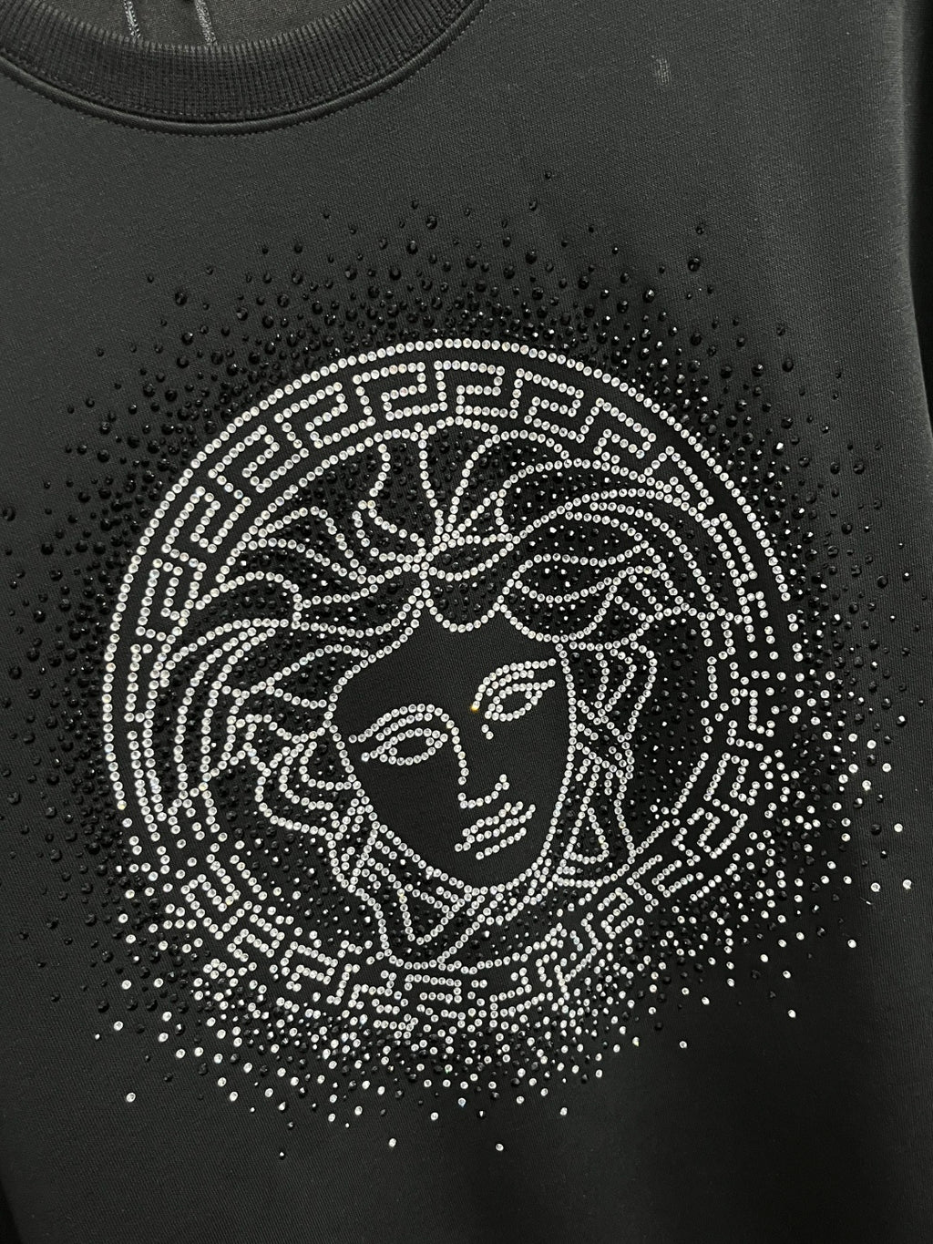 Versace black sweatshirt front with rhinestone Medusa motif