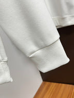 White sweatshirt with ribbed sleeve cuff