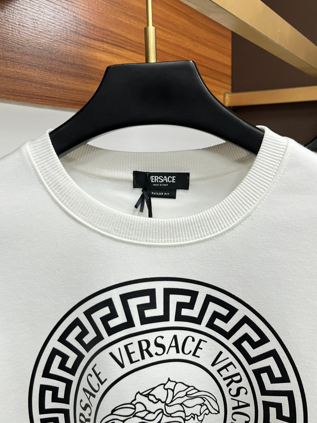 White Versace sweatshirt neckline with Medusa circular emblem