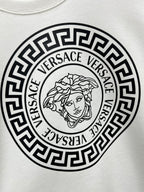 White Versace sweatshirt chest graphic featuring Medusa line art in circular border