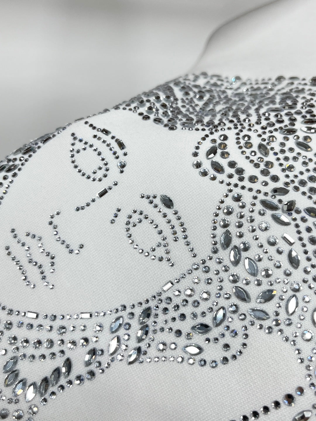 Versace white sweatshirt rhinestone Medusa face pattern in detail