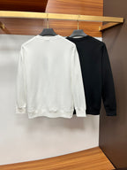 White and black Versace crewneck sweatshirts back view, no front graphic