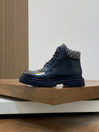 Dark high-top lace-up boots with patterned knit collar and rubber lug sole