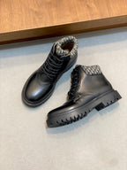 Two-tone dark lace-up boots with patterned collar and thick black rubber outsoles