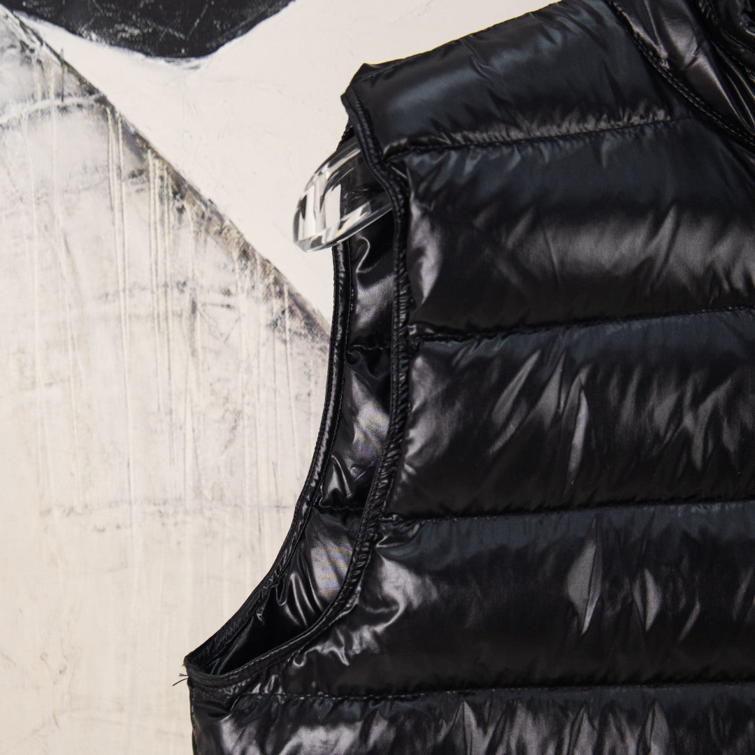 Moncler black sleeveless puffer vest with stitched quilting and zip trim