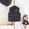 Moncler black quilted puffer vest with full-zip front and logo badge