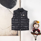 Moncler black quilted puffer vest with full-zip front and logo badge