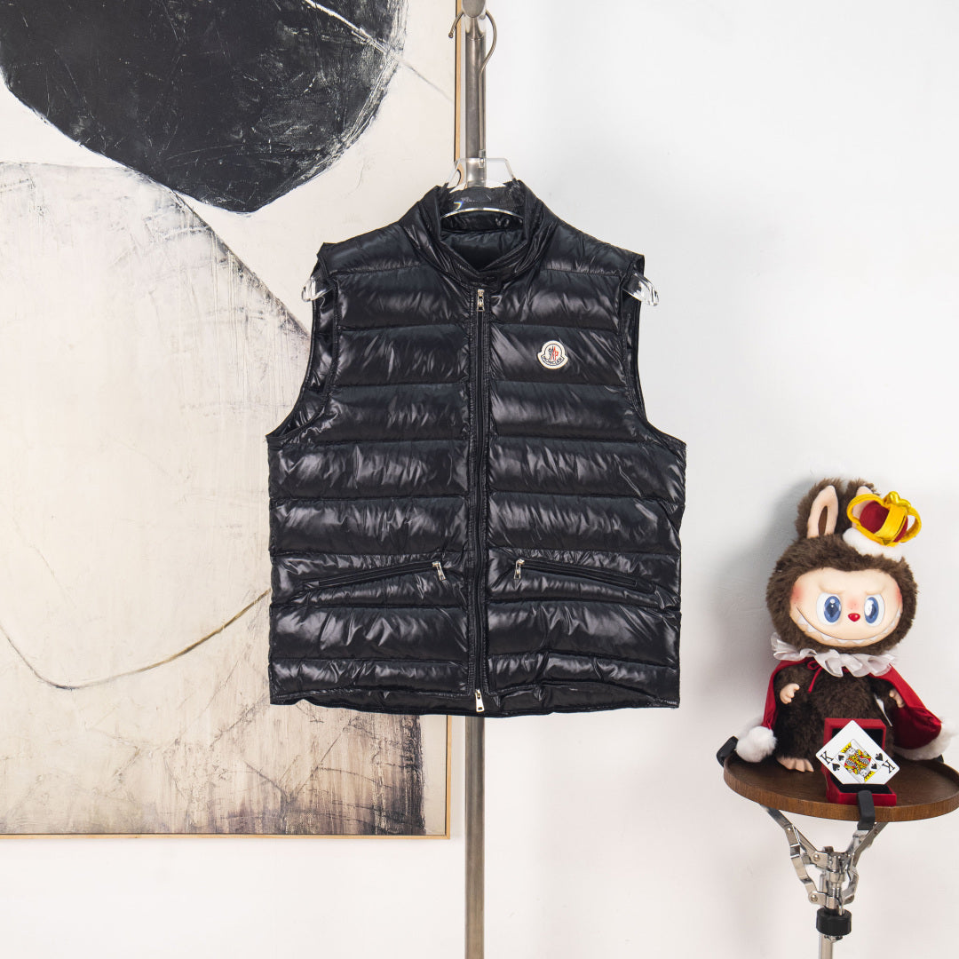 Moncler black quilted puffer vest with full-zip front and logo badge