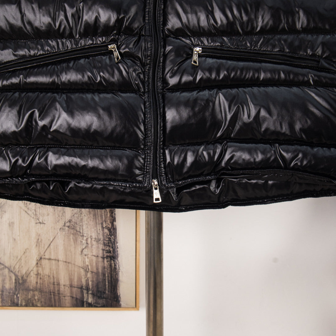 Moncler black quilted puffer vest with center zip and side pocket zips