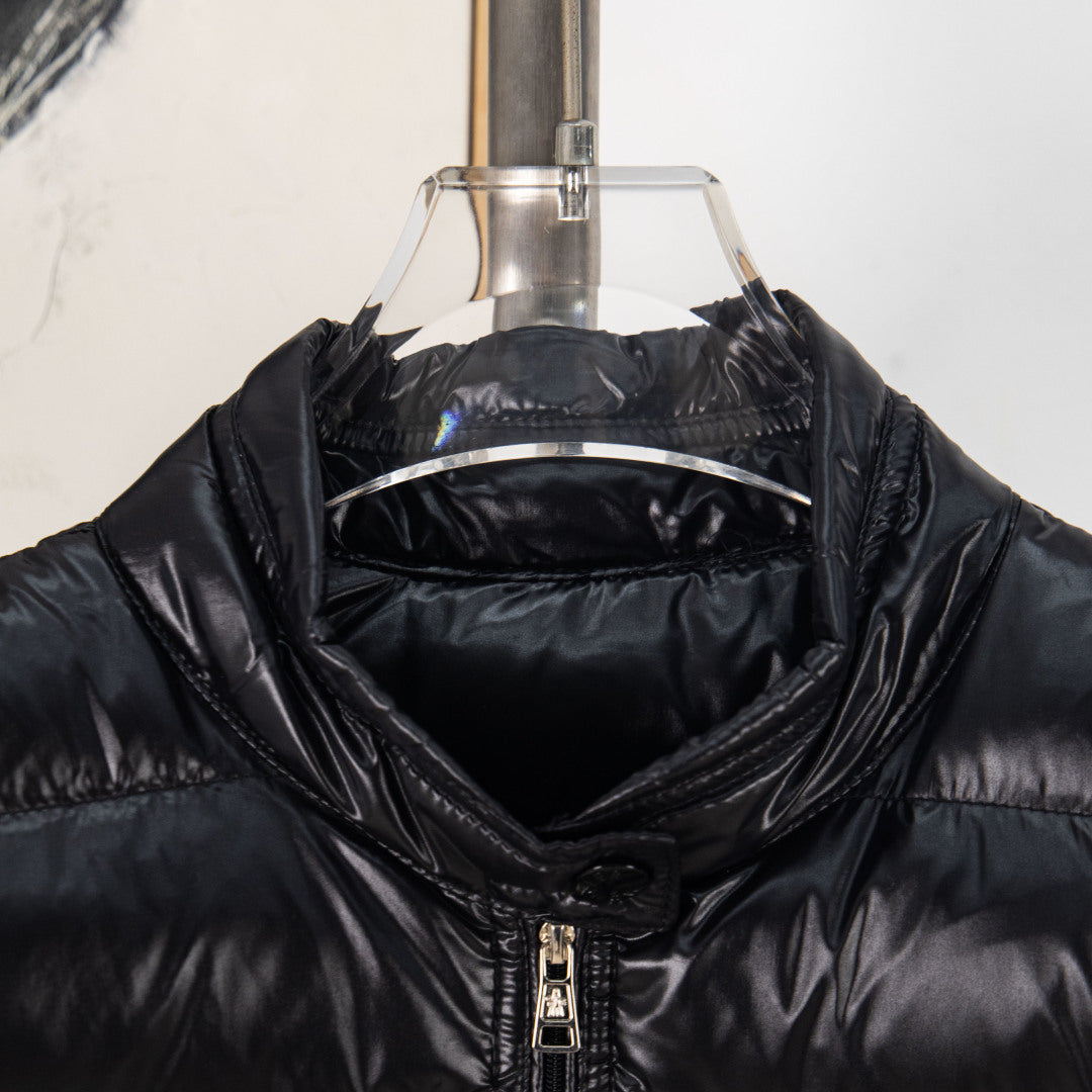 Moncler black puffer vest collar with zipper and quilted interior detail
