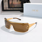 Dior sunglasses with brown tinted lenses and gold-trim frame