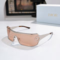 Dior sunglasses with pale pink tinted lenses and metal frame