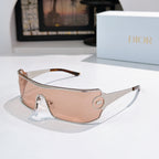 Dior sunglasses with pale pink tinted lenses and metal frame