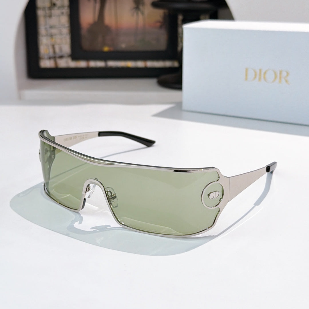 Dior sunglasses with light green tinted lenses and metal frame