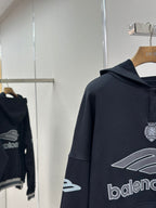 Balenciaga navy pullover hoodie close-up of hood and front logo print