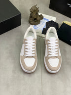 Pair of low-top sneakers, white knit uppers with beige suede trims, white rubber soles