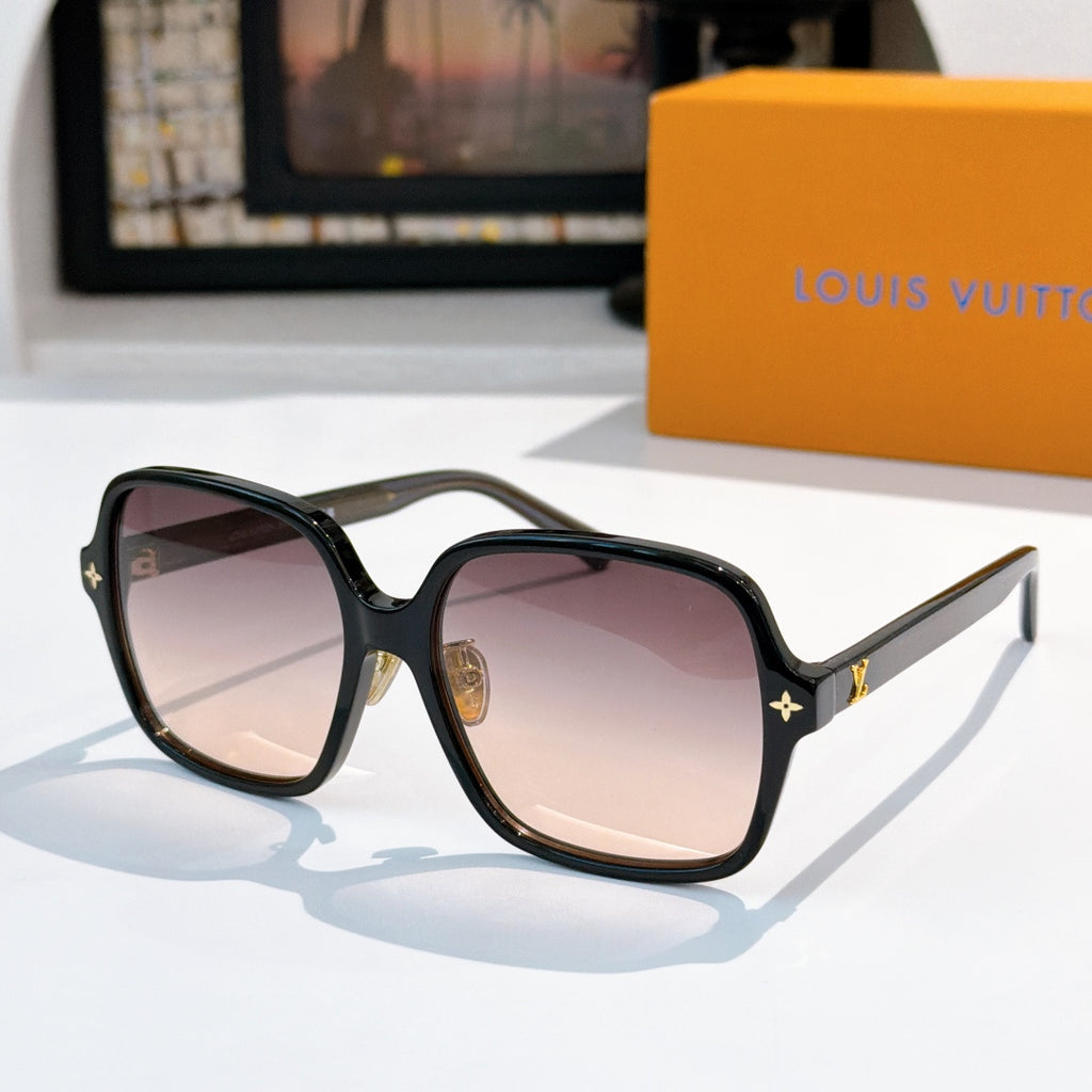 Louis Vuitton sunglasses, dark frame with pink gradient lenses and gold star accents