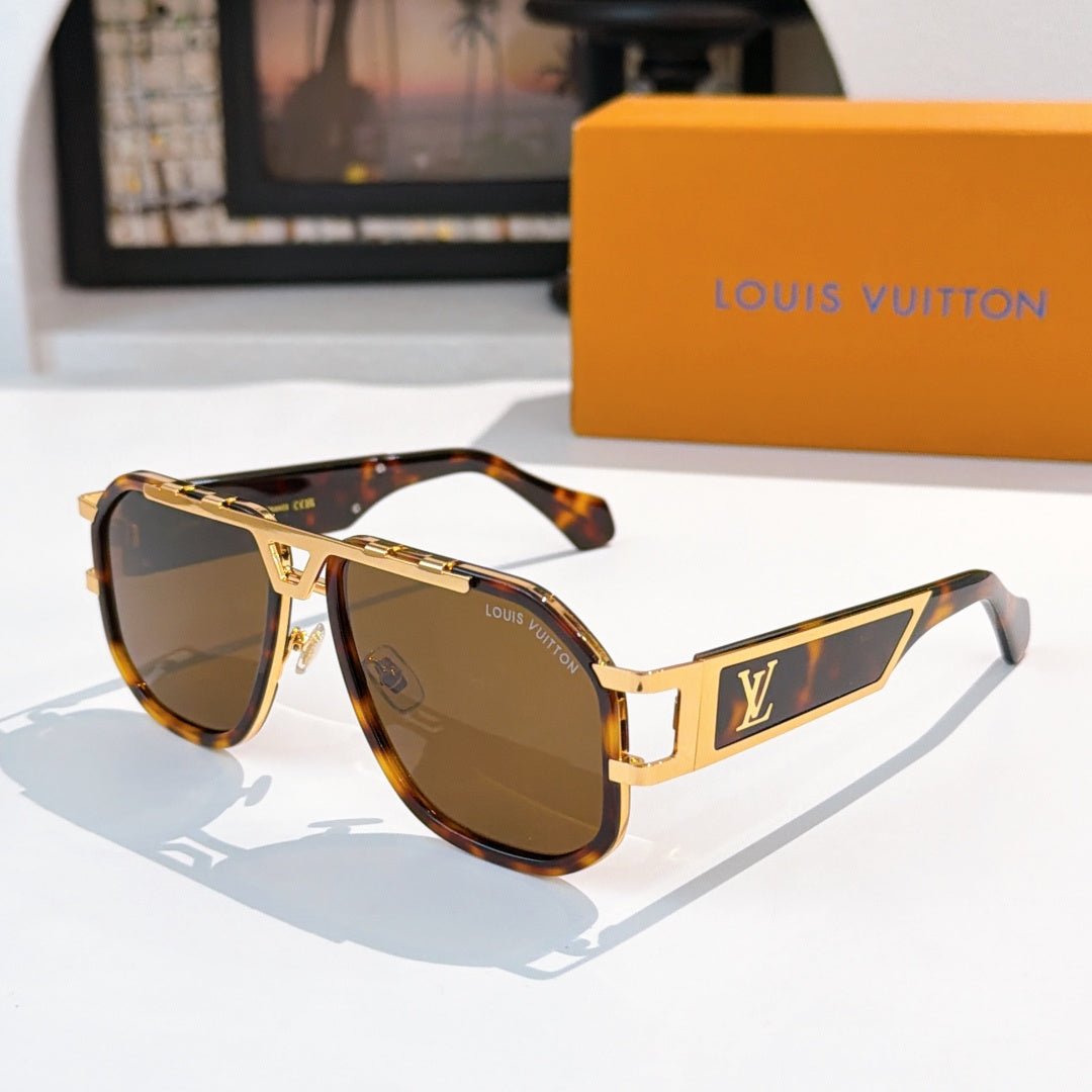 Louis Vuitton sunglasses with tortoiseshell arms, gold frame, and amber lenses