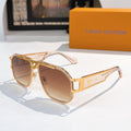 Louis Vuitton sunglasses with gold-tone frame and brown tinted lenses