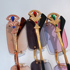 Bvlgari jeweled sunglasses frames with red, blue, and green stone accents