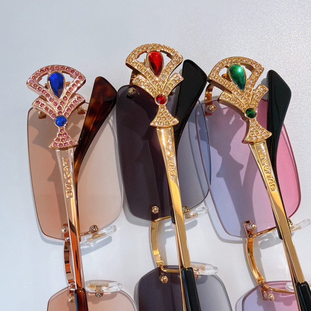 Bvlgari jeweled sunglasses frames with red, blue, and green stone accents