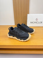 Moncler lace-up sneakers in dark navy with chunky sole and contrast gum tread