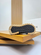 Moncler sneakers outsole view, textured tread with gum yellow rubber base
