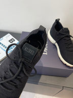 Black sneaker tongue and laces with Dior logo branding detail
