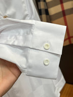 Burberry long-sleeve cuff with two white buttons and gathered sleeve placket