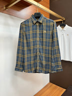 Burberry plaid dress shirt with long sleeves, button-front, and pointed collar