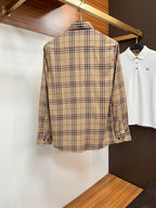 Beige plaid long-sleeve button-up shirt, back view, with buttoned cuffs