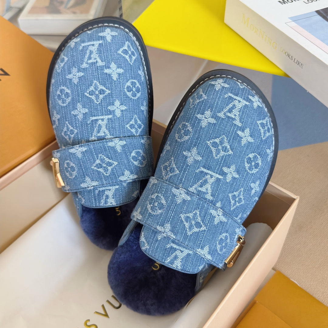 Louis Vuitton monogram sandals with blue patterned straps and cushioned navy footbed
