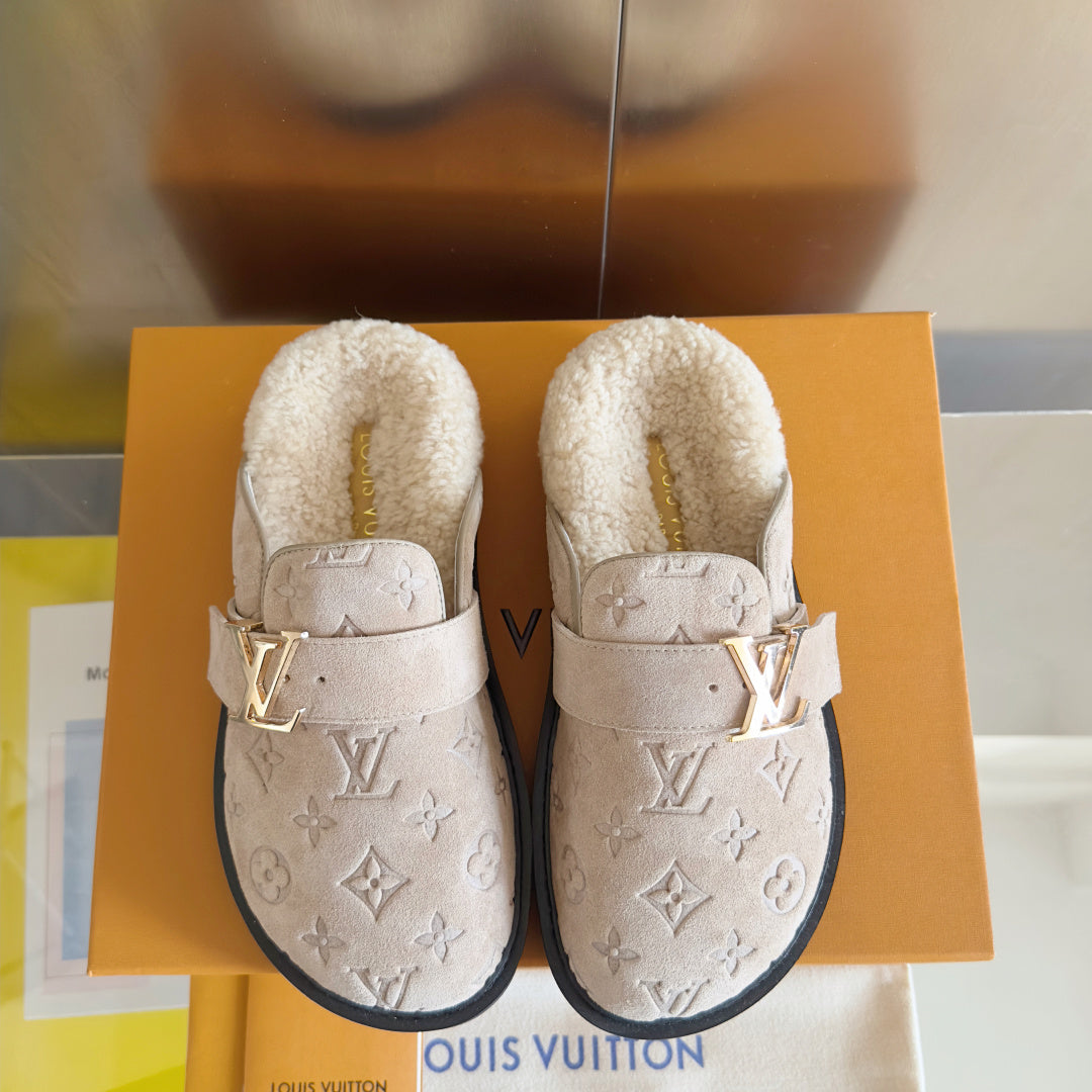 Louis Vuitton monogram slide sandals, tan suede with gold buckle and shearling-lined footbed