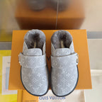 Louis Vuitton monogram slide sandals, gray upper, faux-fur lining, metal buckle strap