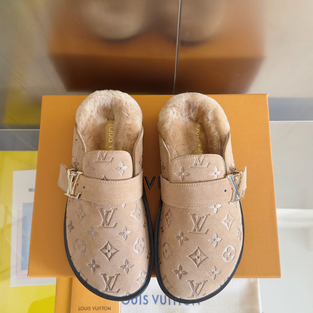 Pair of monogram slide sandals with gold buckles, beige.
