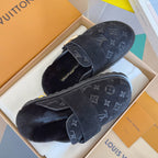 Louis Vuitton monogram slide sandals in dark suede with gold buckle and plush lining