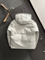 Gucci hooded jacket back view, light-gray monogram, central hood and pockets