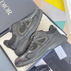 Dior unisex sneakers dark gray, two shoes showing side panels and lace-up lugs