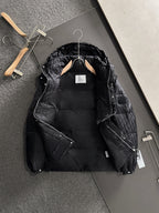 Long black puffer jacket with hood, open front, visible lining, front zipper, Dior monogram