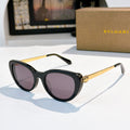 Bvlgari cat-eye sunglasses with black frames and dark tinted lenses