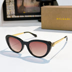 Bvlgari sunglasses with black frames and pink tinted lenses