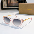 Bvlgari sunglasses with pink frames and dark violet tinted lenses