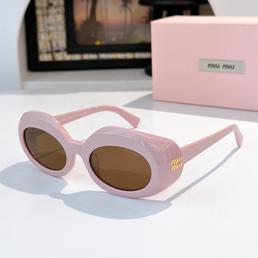 MiuMiu light pink sunglasses with round brown lenses and logo on temple
