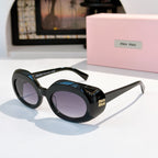 MiuMiu black sunglasses with round lenses and logo on the temples