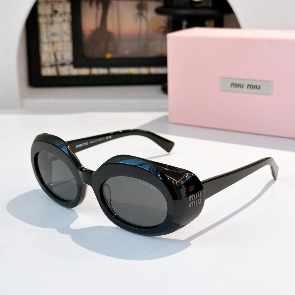 MiuMiu dark sunglasses with round lenses, side logo on the temples