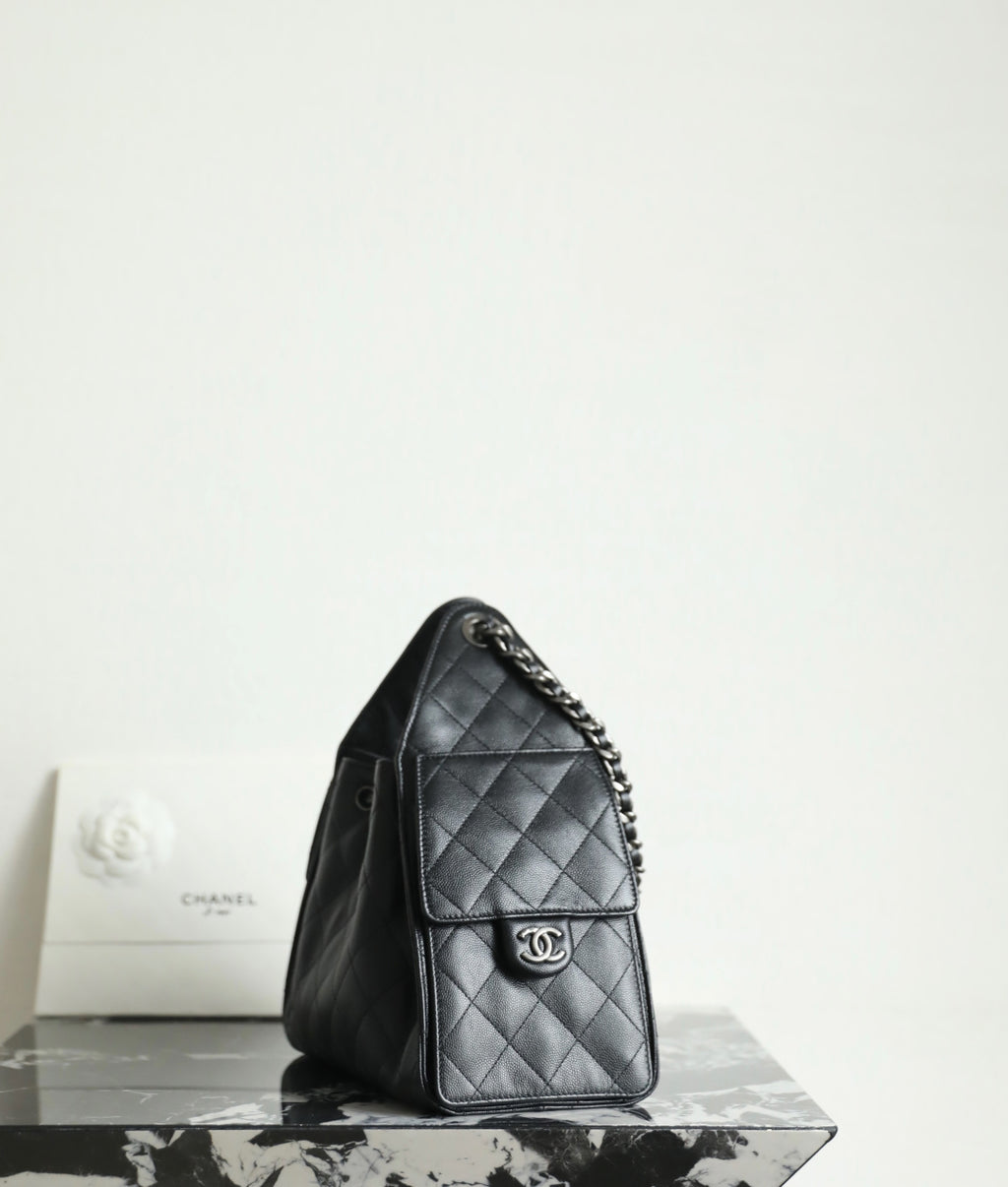 Chanel black quilted leather flap bag with chain strap and CC logo