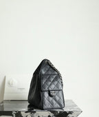 Chanel black quilted leather flap bag with chain strap and CC logo